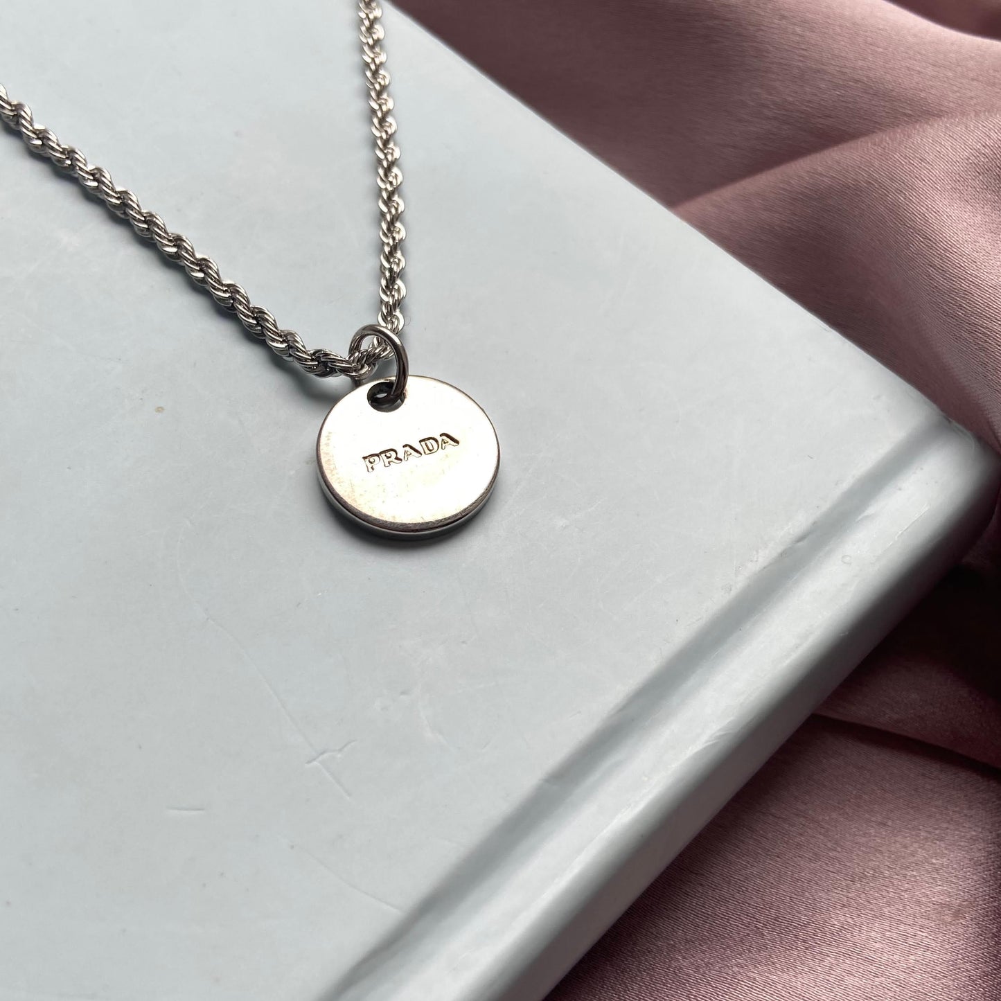 Authentic Silver Prada Mini circle tag - Repurposed Necklace