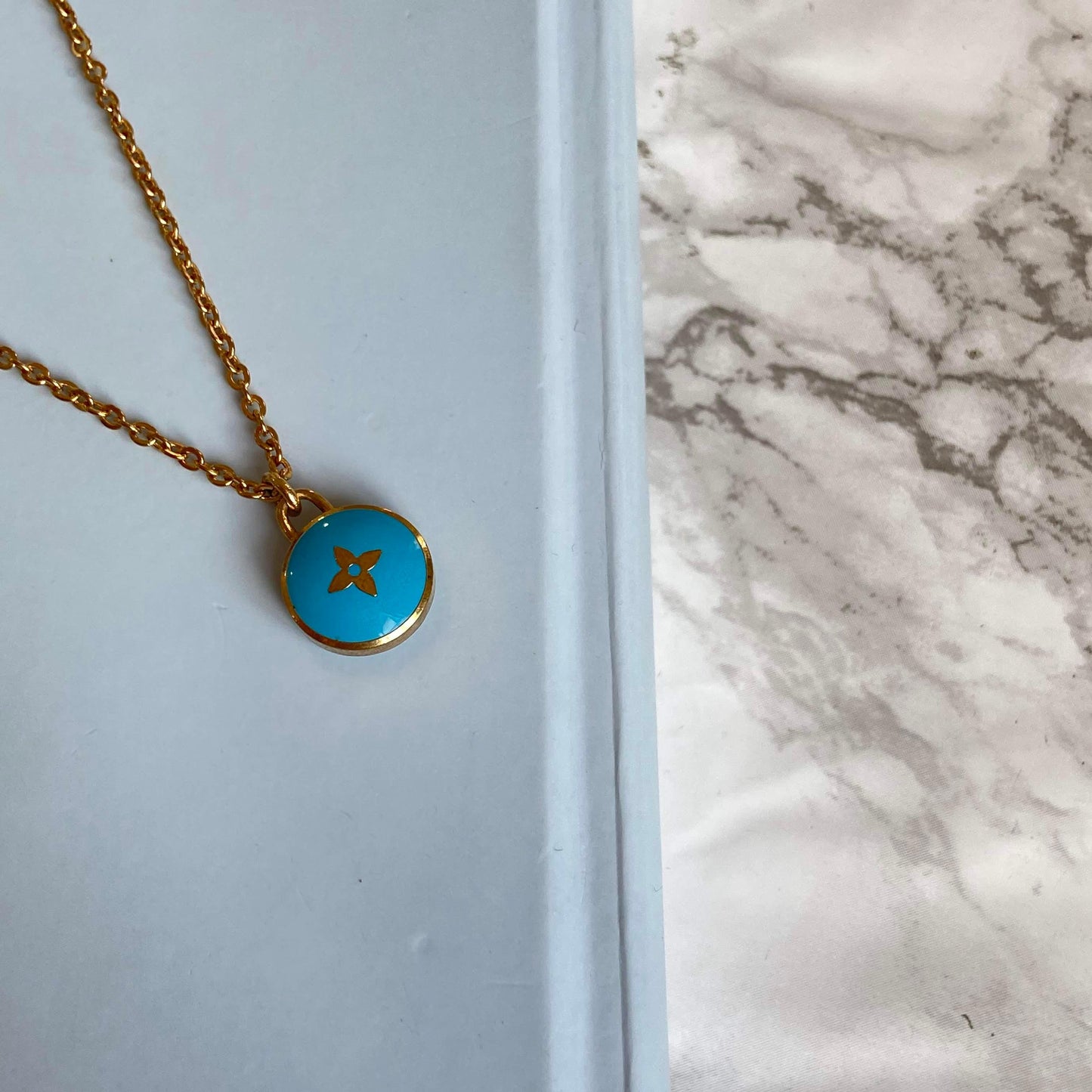 Authentic Louis Vuitton Sapphire Blue Pendant Pastilles