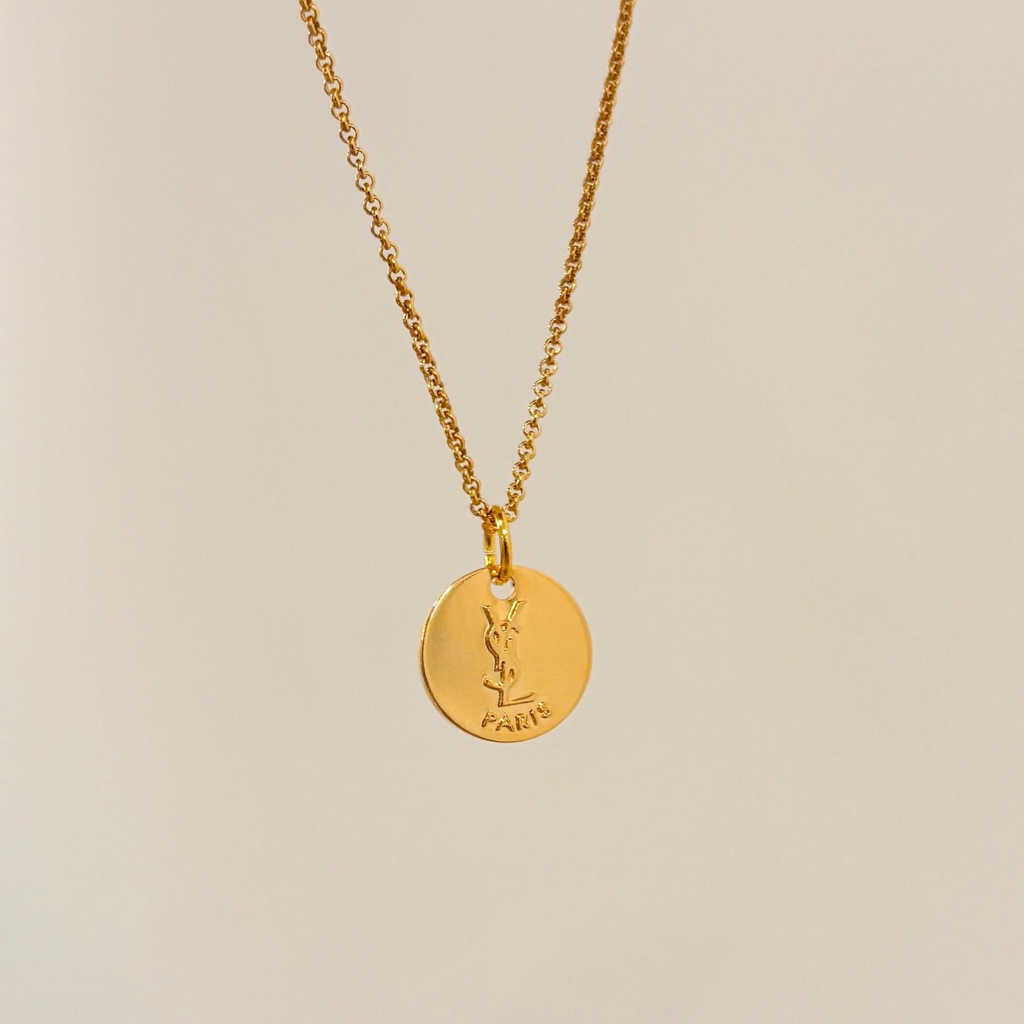 Authentic repurposed YSL logo coin necklace