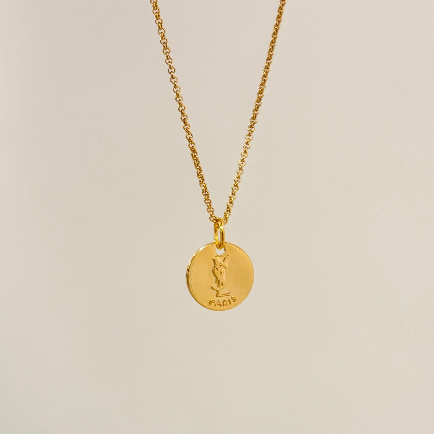 Authentic repurposed YSL logo coin necklace