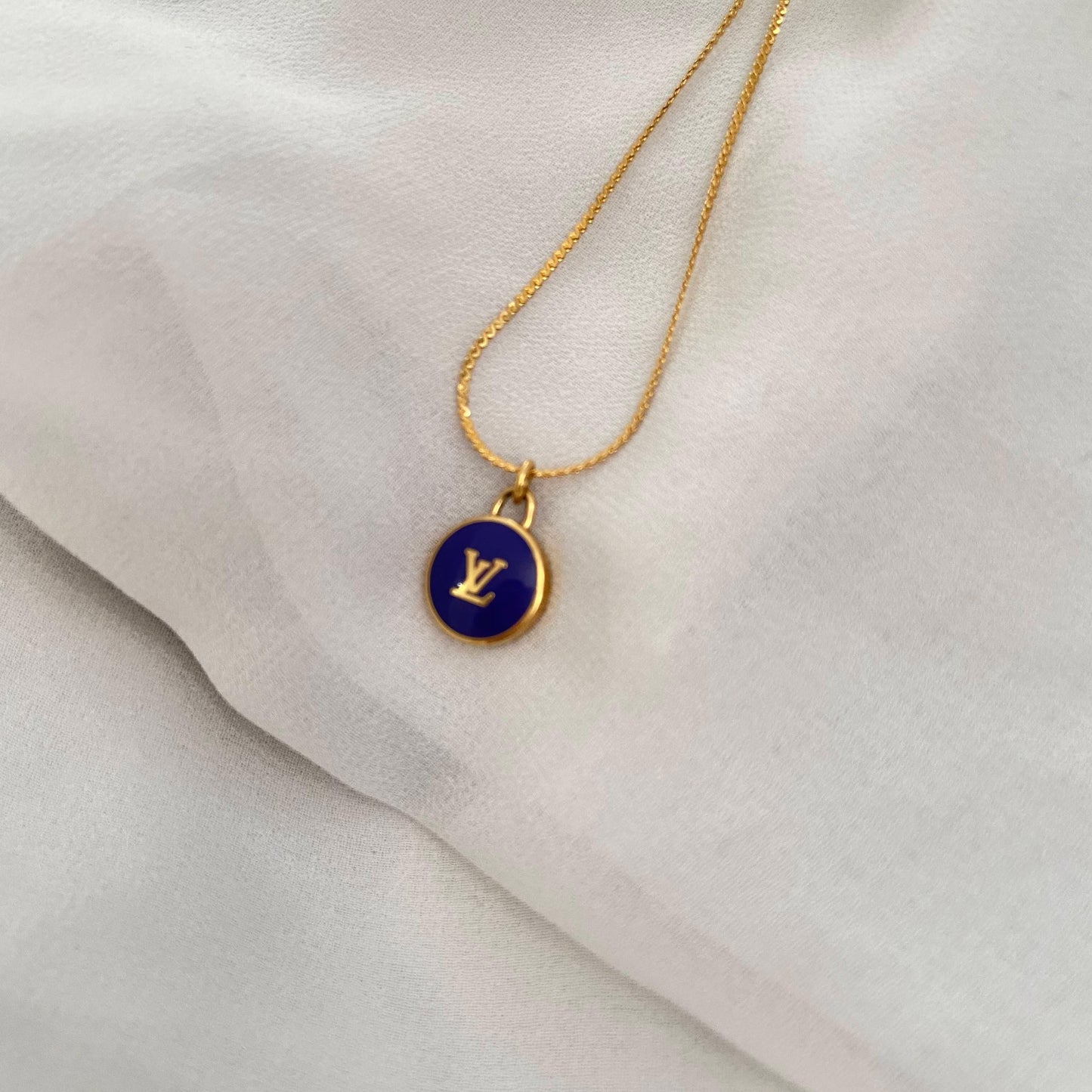Authentic Louis Vuitton Pendant Logo Blue dark Pastilles