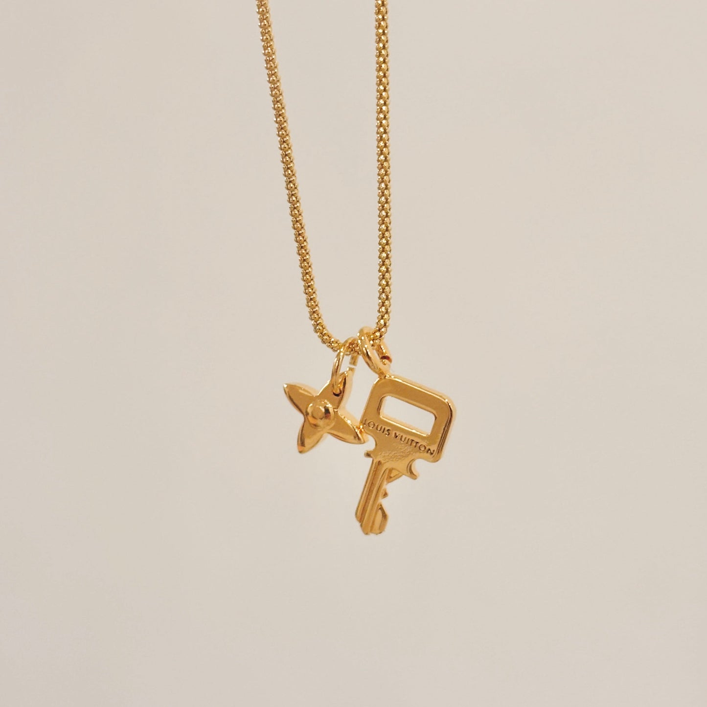 Authentic repurposed Louis Vuitton engraved key necklace