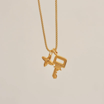 Authentic repurposed Louis Vuitton engraved key necklace
